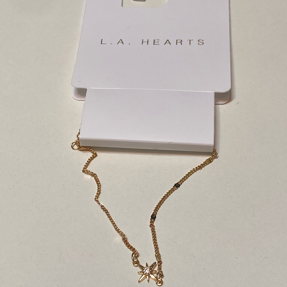La hearts gold starburst bracelet